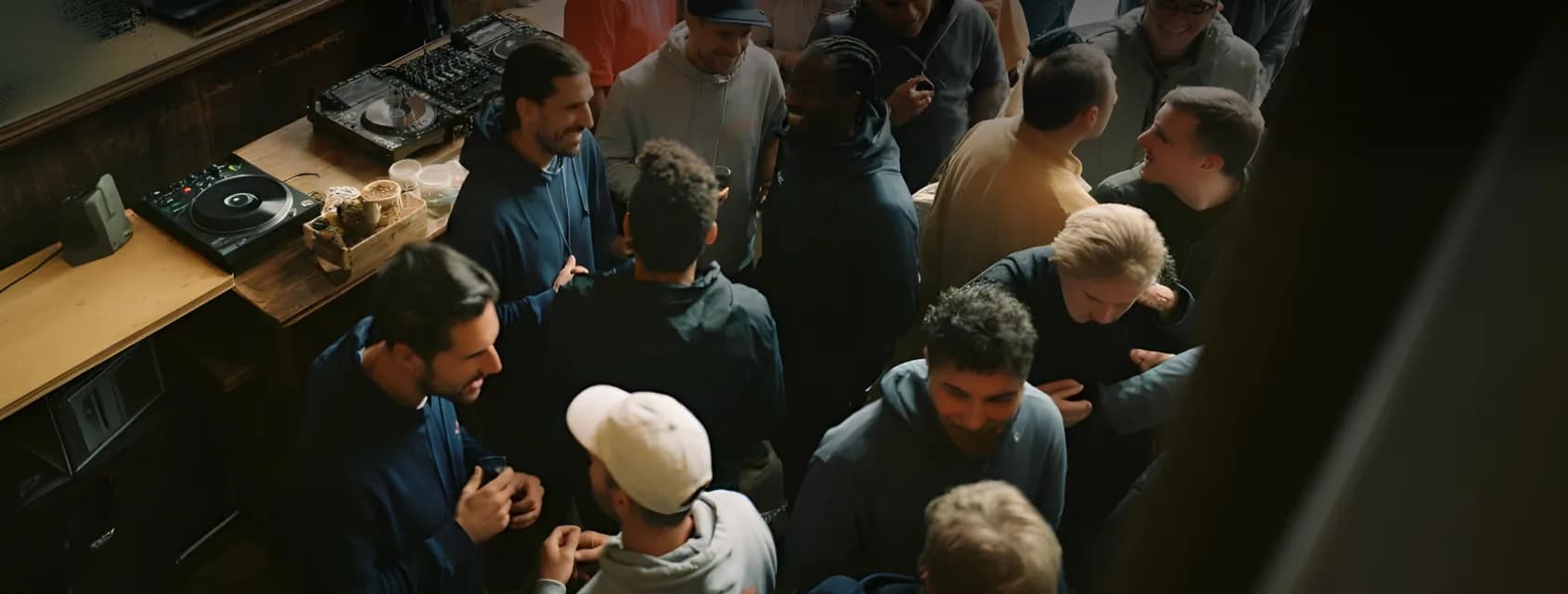 Group of people running together at a rave-themed event